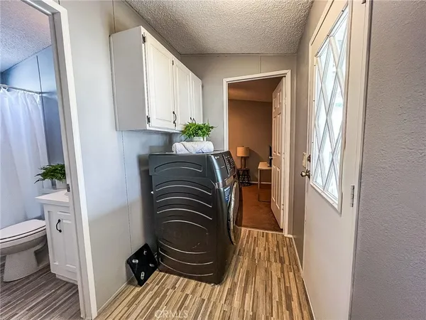 a view of a bedroom from a hallway