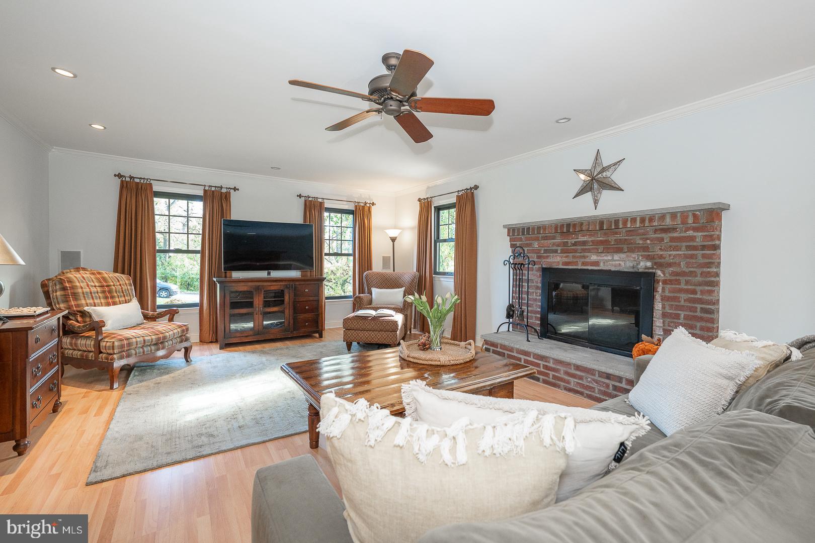 800 Maple Glen Lane Wayne, PA 19087 - Photo 11 of 52 a living room with furniture and a fireplace