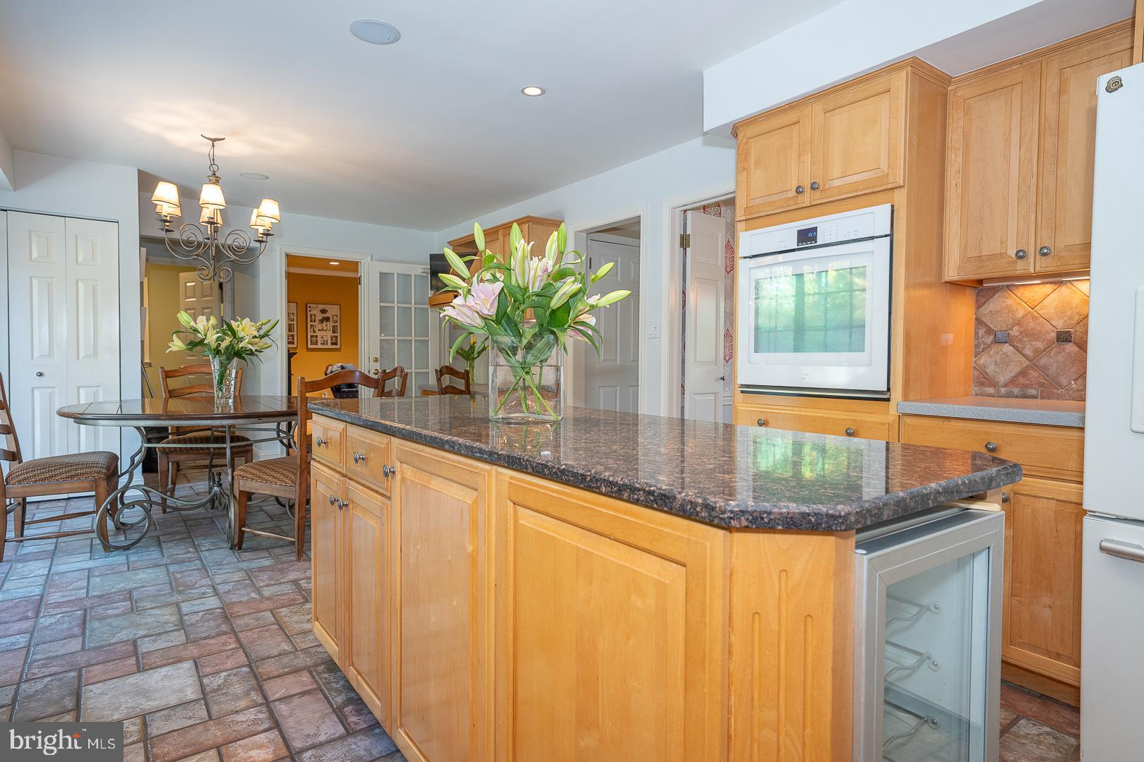 800 Maple Glen Lane Wayne, PA 19087 - Photo 21 of 52 a view of a kitchen with dining table and chairs