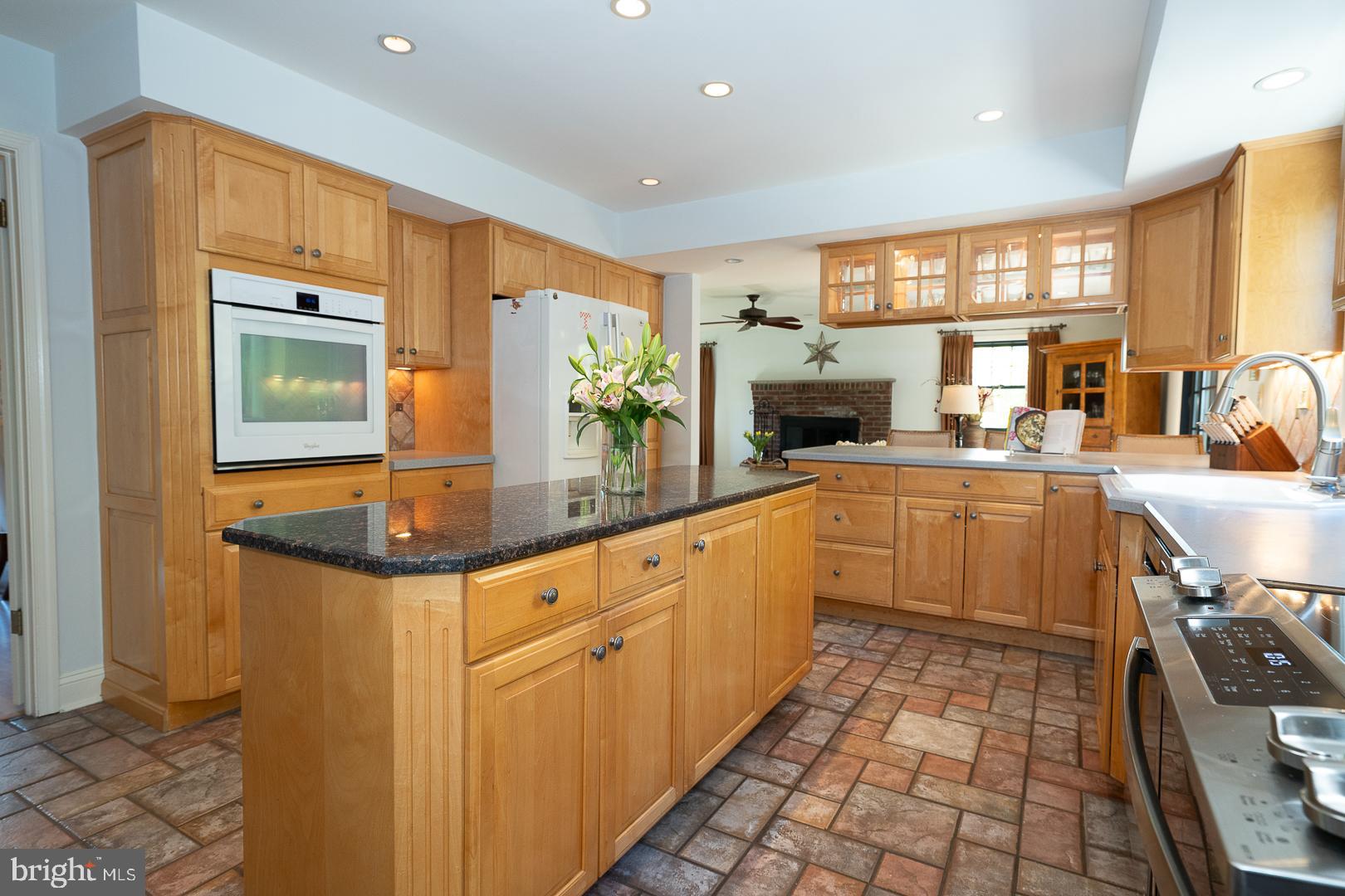 800 Maple Glen Lane Wayne, PA 19087 - Photo 24 of 52 a kitchen with stainless steel appliances a sink a stove and a refrigerator