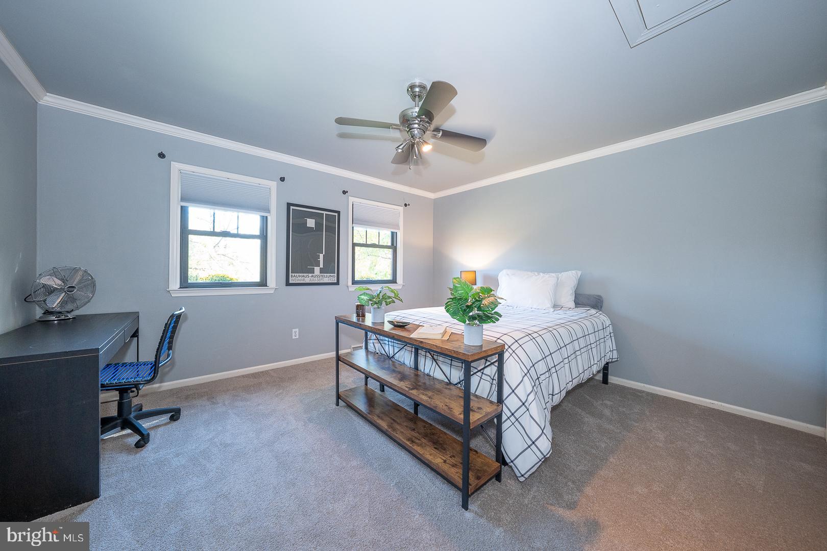 800 Maple Glen Lane Wayne, PA 19087 - Photo 40 of 52 a bed room with a bed chair and a window