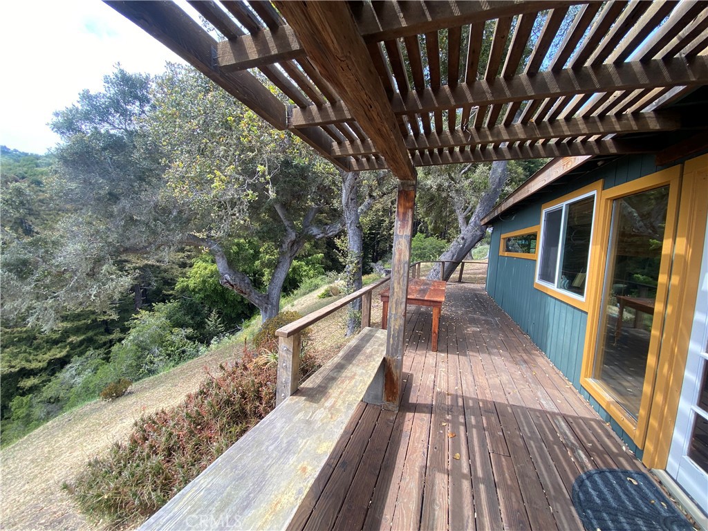 0 Morning Glory Ranch Big Sur, CA 93920 - Photo 13 of 35 a view of balcony with wooden floor and fence