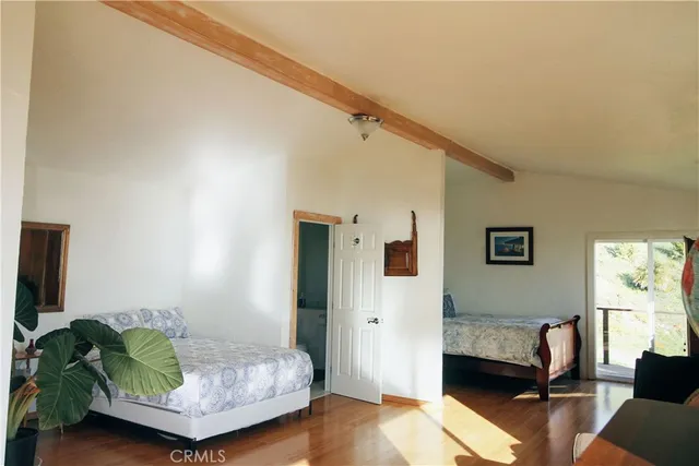 a bedroom with furniture and a couch