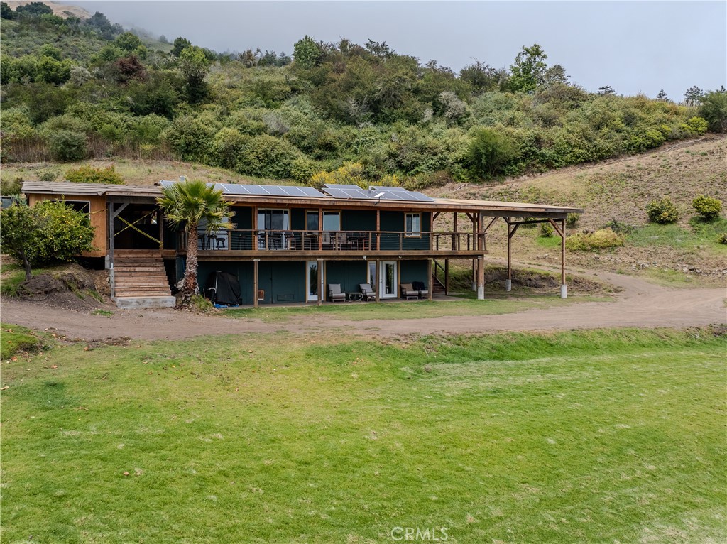 0 Morning Glory Ranch Big Sur, CA 93920 - Photo 4 of 35 an outdoor view of house with swimming pool and green space