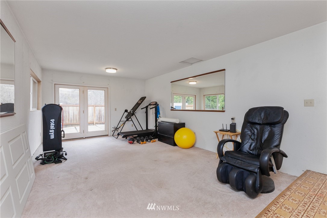 15408 Southeast Jones Road Renton, WA 98058 - Photo 15 of 40 a view of a room with gym equipment