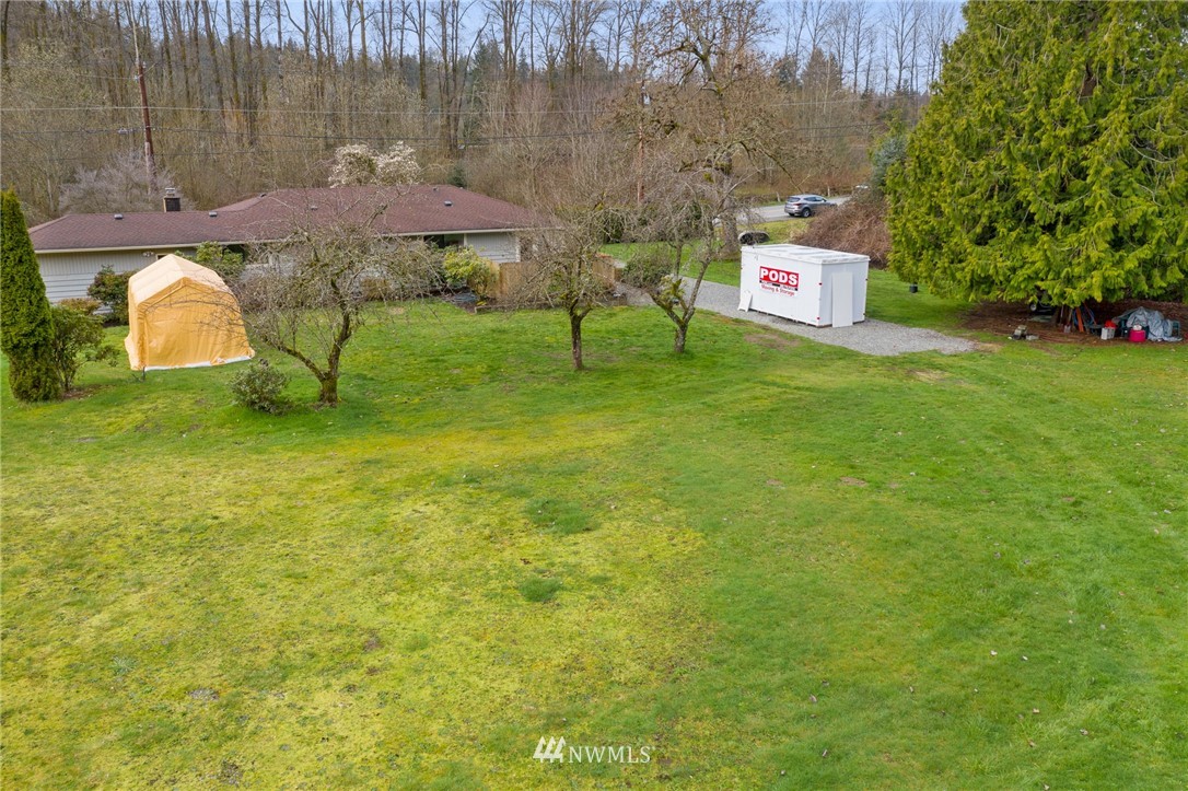 15408 Southeast Jones Road Renton, WA 98058 - Photo 38 of 40 a view of a house with a yard