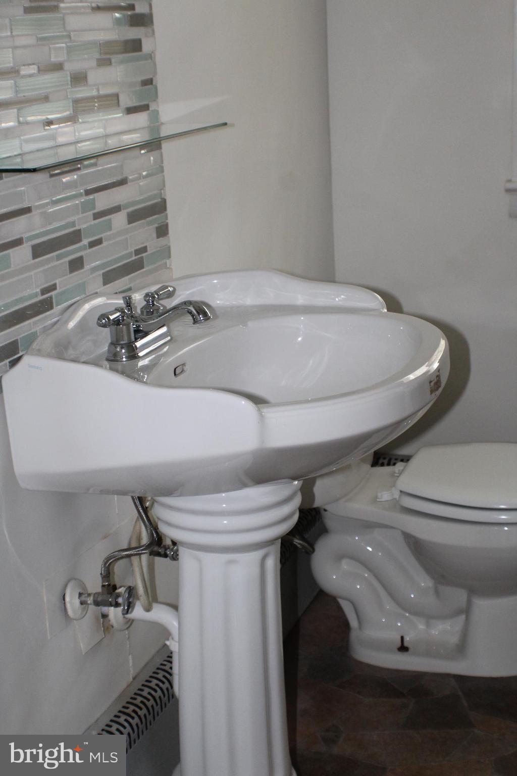201 East 2nd Avenue Ranson, WV 25438 - Photo 14 of 43 Lovely pedestal sink