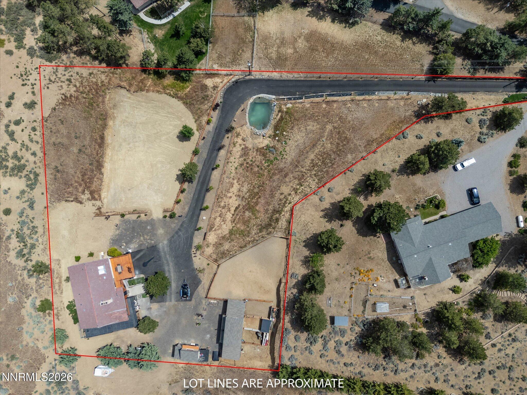 20449 Temelec Way Reno, NV 89521 - Photo 4 of 65 an aerial view of a house with a yard