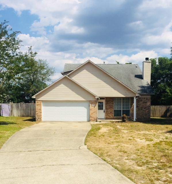 13 Holly Road Crestview, FL 32539 - Photo 1 of 19 a house with swimming pool in front of it
