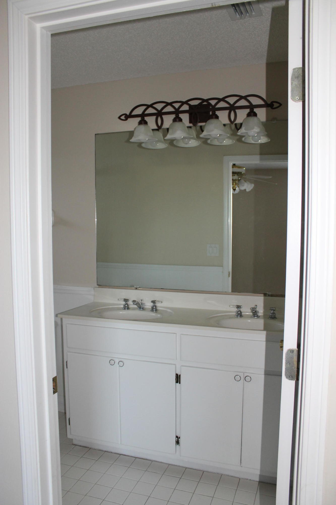 13 Holly Road Crestview, FL 32539 - Photo 11 of 19 a close view of a utility room with washer and dryer