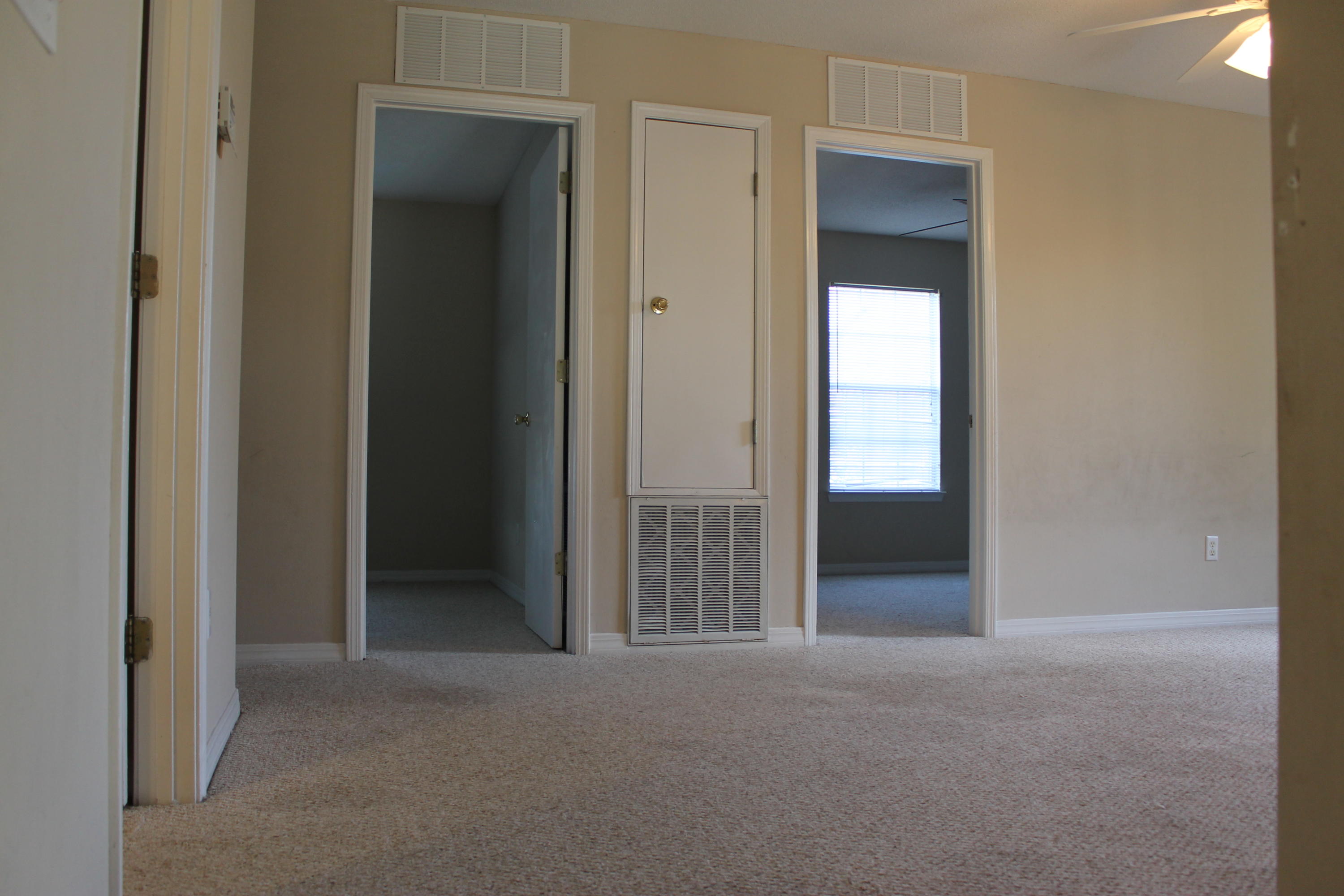 13 Holly Road Crestview, FL 32539 - Photo 13 of 19 a view of an empty room with closet and mirror