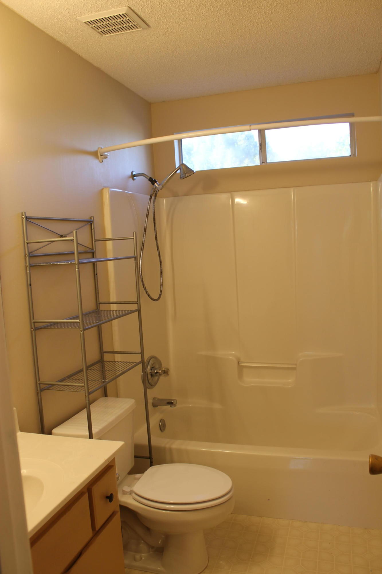 13 Holly Road Crestview, FL 32539 - Photo 15 of 19 a bathroom with a toilet and shower