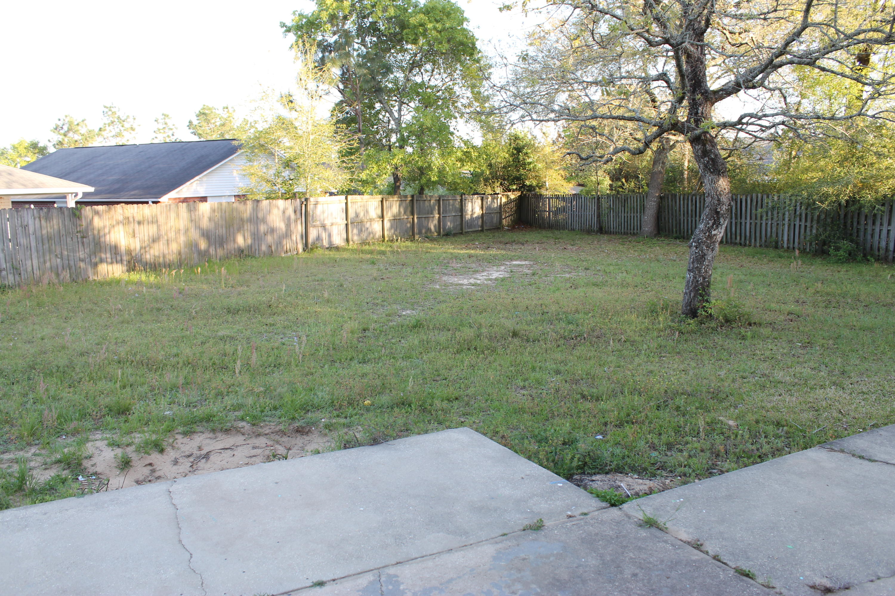 13 Holly Road Crestview, FL 32539 - Photo 18 of 19 a view of a yard with an tree