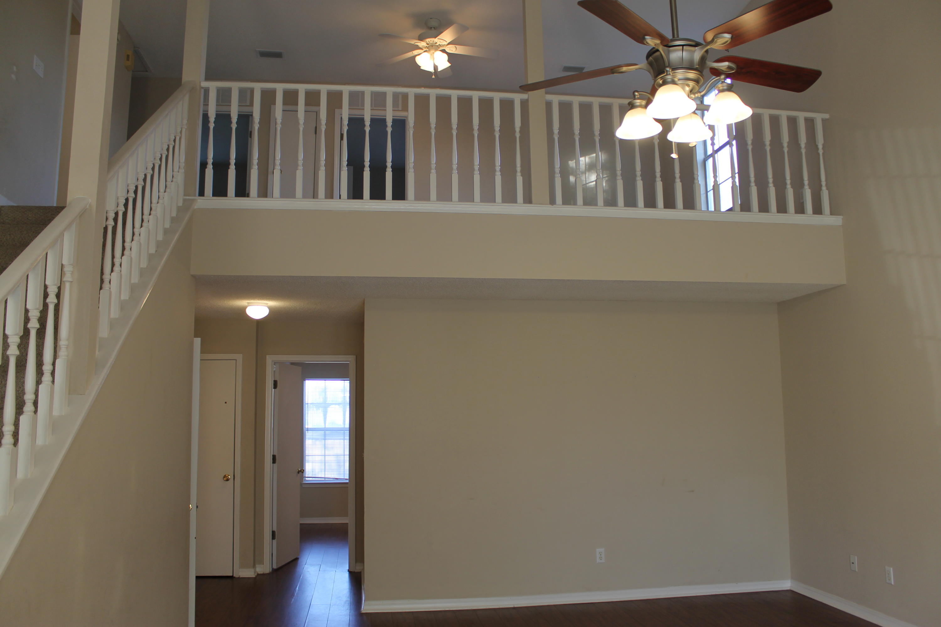 13 Holly Road Crestview, FL 32539 - Photo 4 of 19 wooden floor in an empty room
