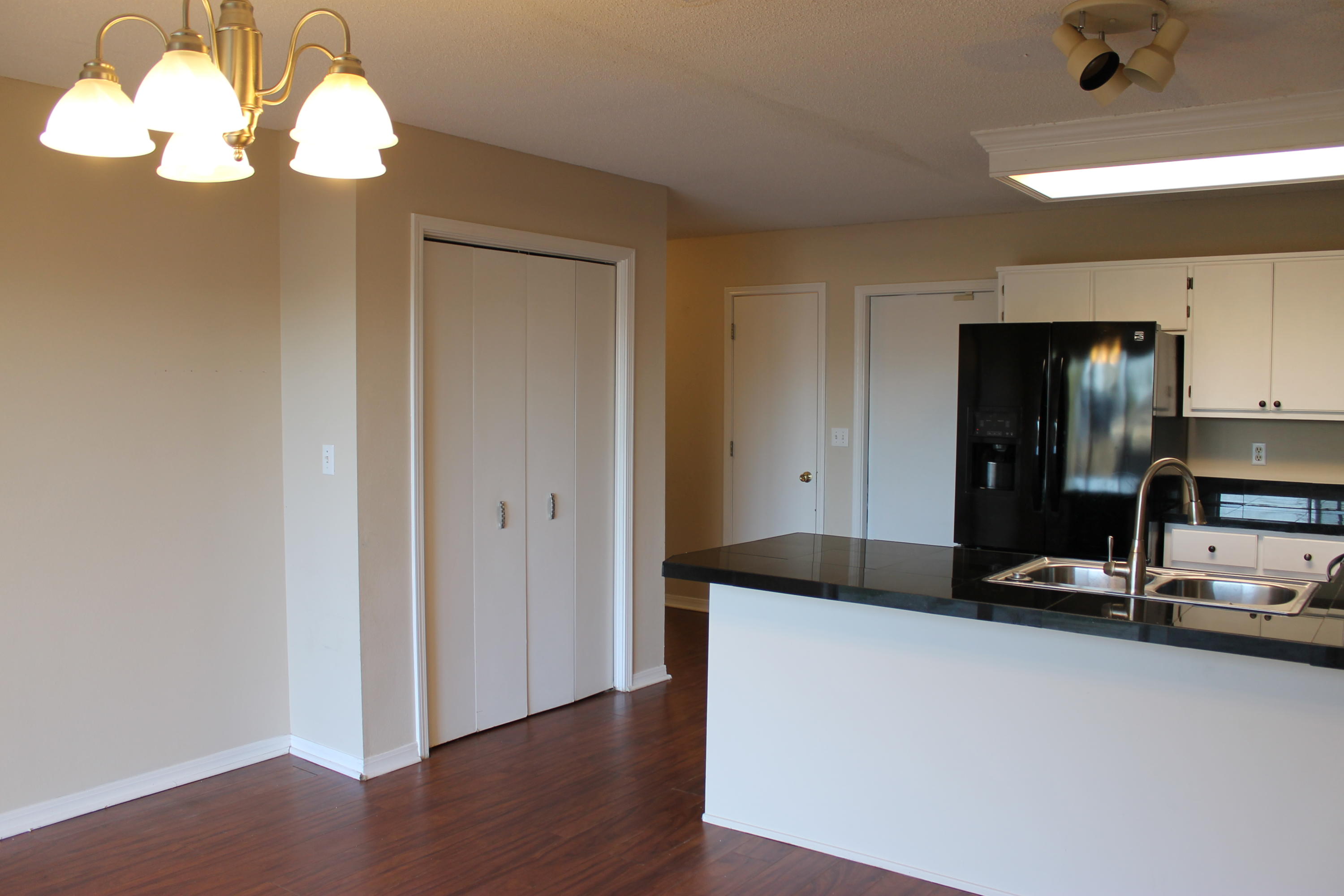 13 Holly Road Crestview, FL 32539 - Photo 6 of 19 a living room with kitchen island granite countertop wooden floor