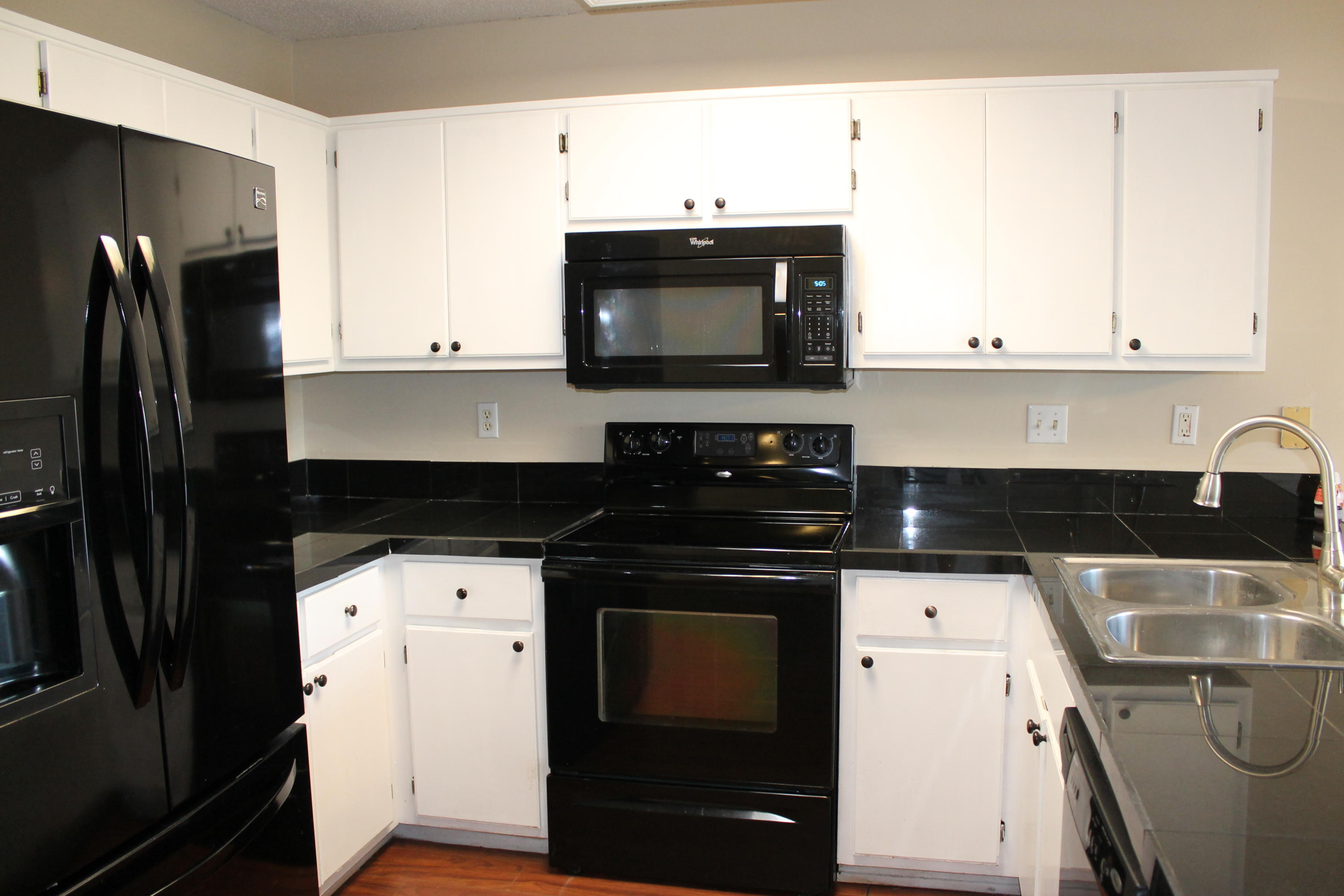 13 Holly Road Crestview, FL 32539 - Photo 7 of 19 a kitchen with a stove microwave and sink