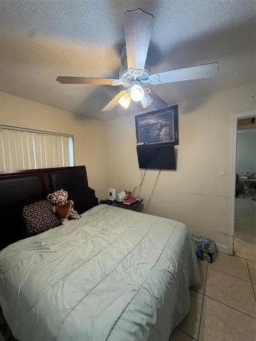 a bathroom with a sink a mirror and a toilet