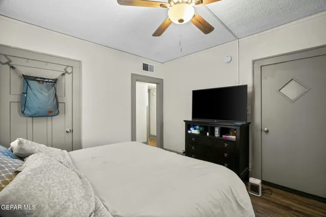 a view of room with toys and wooden floor