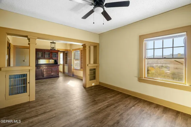 a kitchen with stainless steel appliances granite countertop a sink and a stove