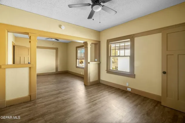 a view of a balcony with wooden floor