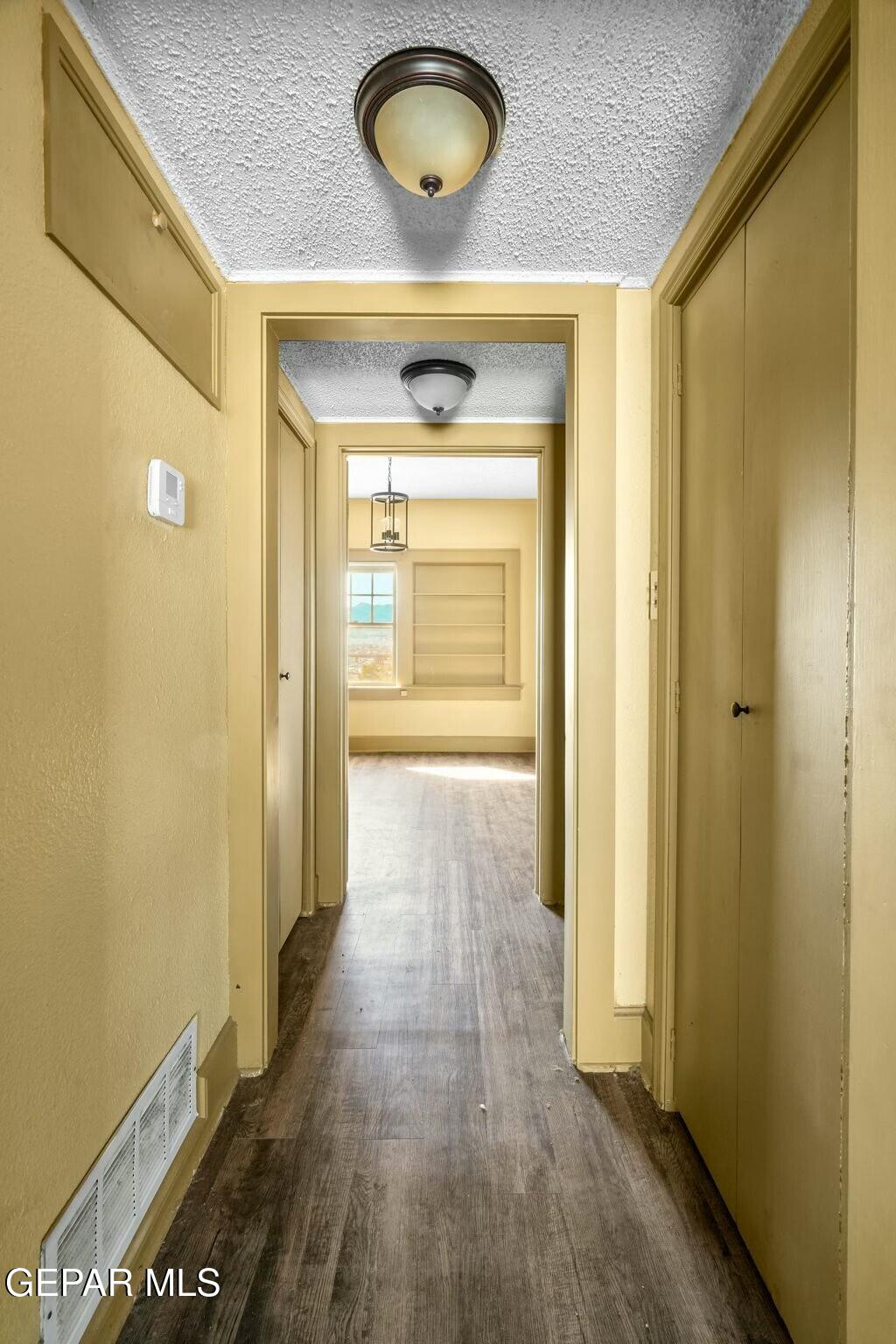 500 Fewel Street, Unit A & B El Paso, TX 79902 - Photo 54 of 61 a view of a hallway with wooden floor