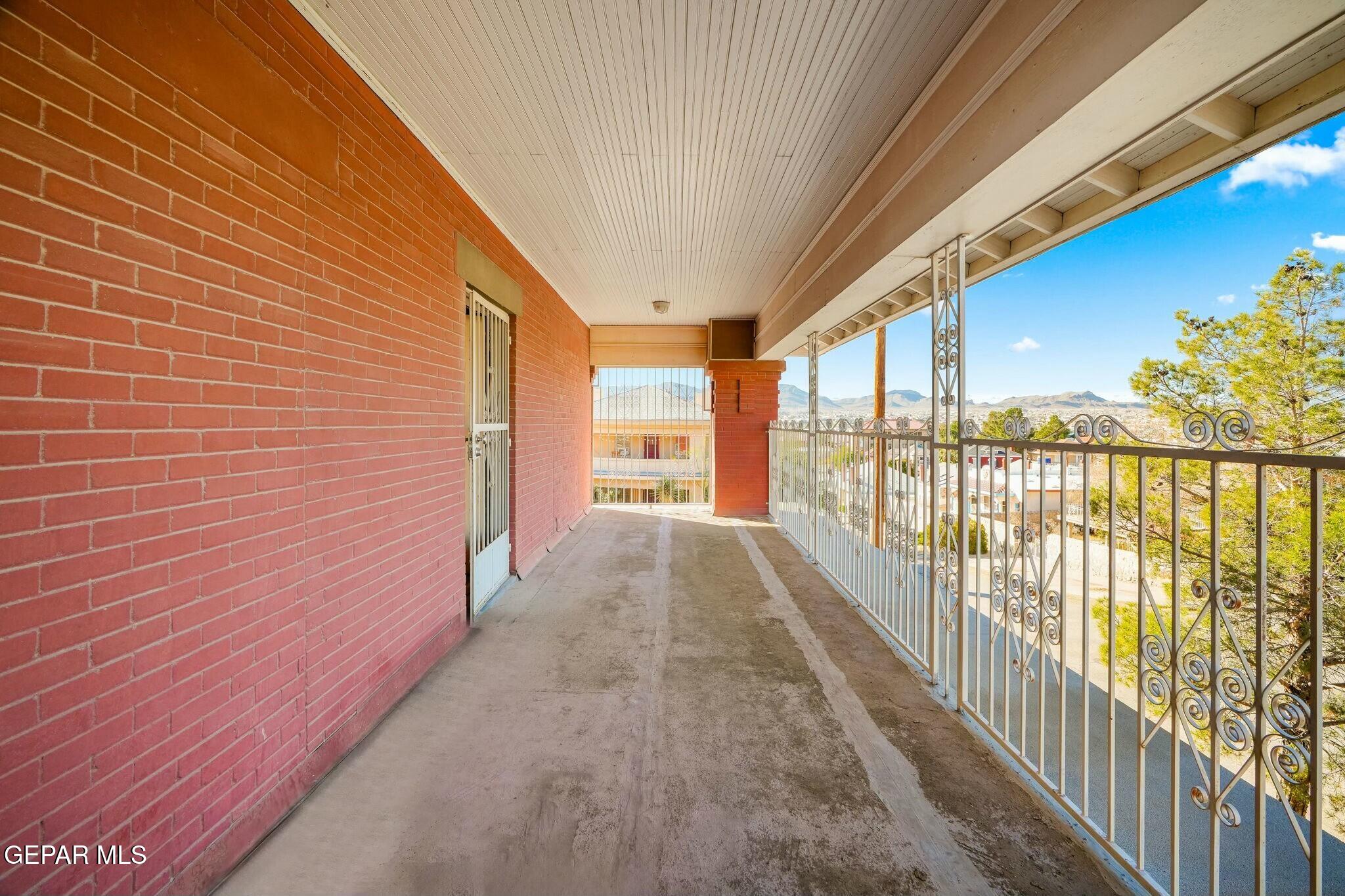 500 Fewel Street, Unit A & B El Paso, TX 79902 - Photo 56 of 61 a view of a balcony with wooden floor