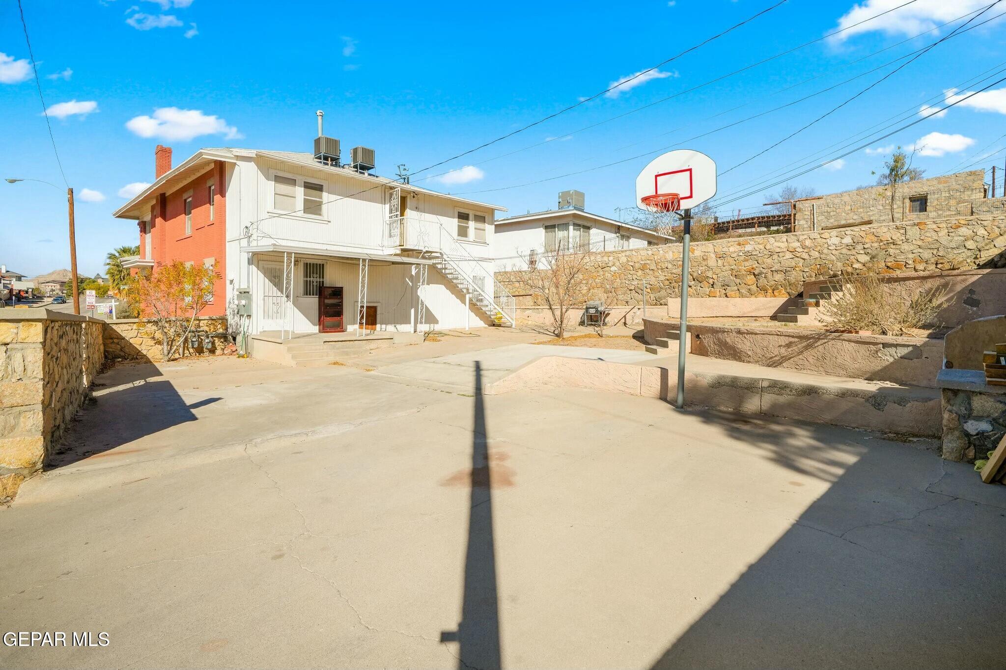 500 Fewel Street, Unit A & B El Paso, TX 79902 - Photo 59 of 61 a view of a hall with wooden floor
