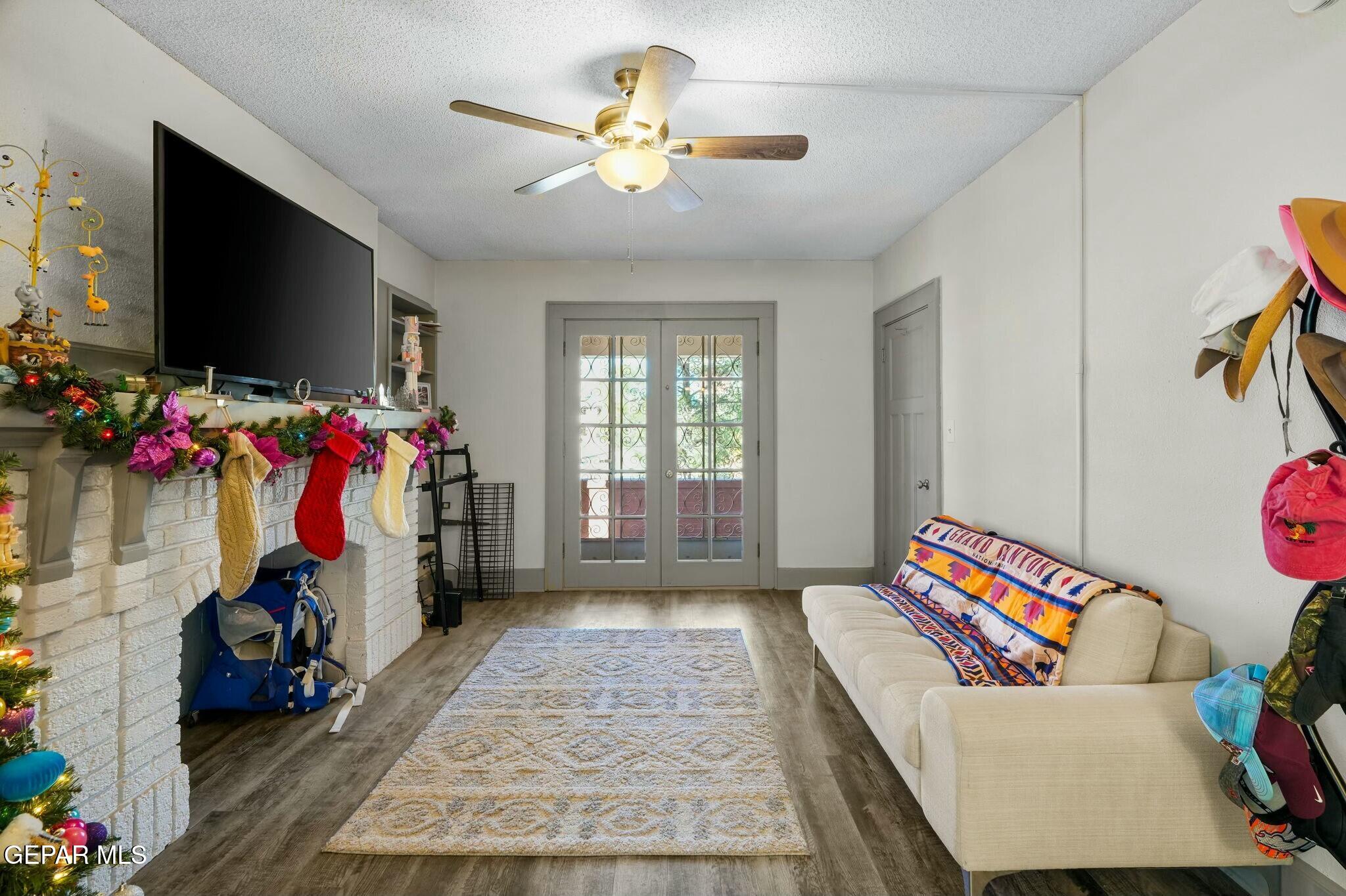 500 Fewel Street, Unit A & B El Paso, TX 79902 - Photo 8 of 61 a living room with furniture and a flat screen tv