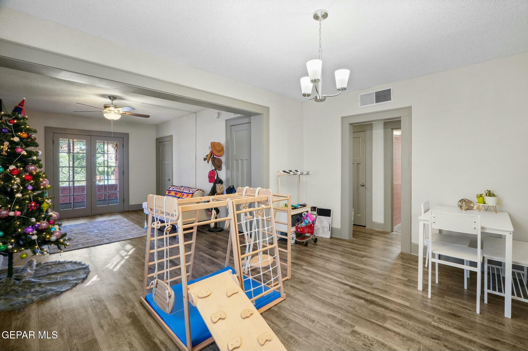 500 Fewel Street, Unit A & B El Paso, TX 79902 - Photo 10 of 61 a view of a dining room with furniture window and wooden floor