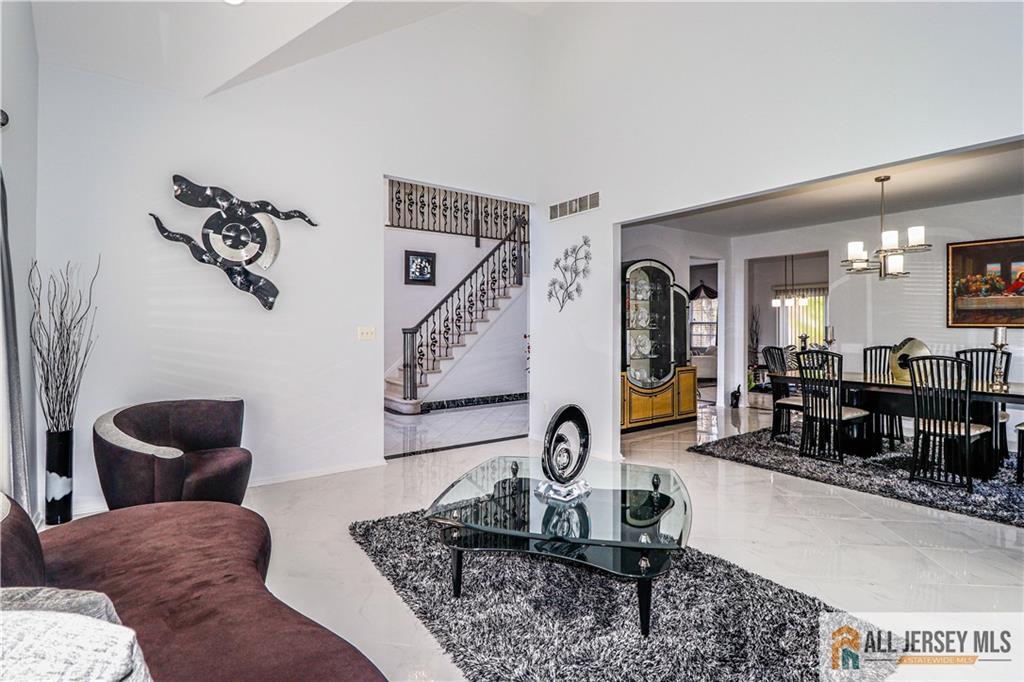 11 Markham Circle Old Bridge, NJ 08857 - Photo 11 of 61 a living room with furniture and wooden floor