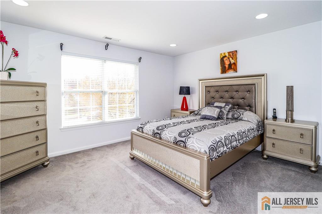 11 Markham Circle Old Bridge, NJ 08857 - Photo 25 of 61 a bedroom with a bed and a window