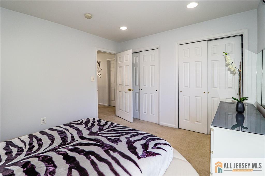 11 Markham Circle Old Bridge, NJ 08857 - Photo 27 of 61 a bedroom with a bed and a walk in closet