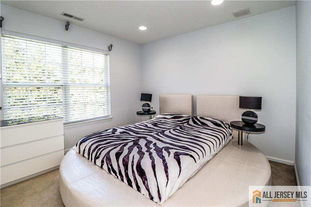11 Markham Circle Old Bridge, NJ 08857 - Photo 28 of 61 a bedroom with a bed and a large window