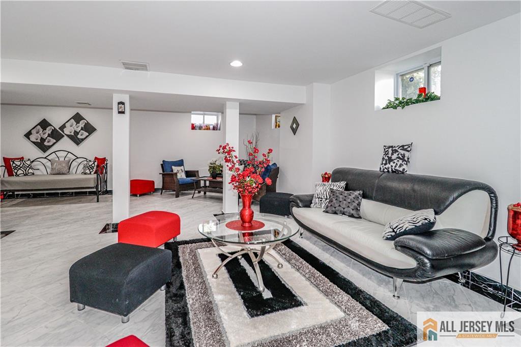 11 Markham Circle Old Bridge, NJ 08857 - Photo 39 of 61 a living room with furniture and a couch