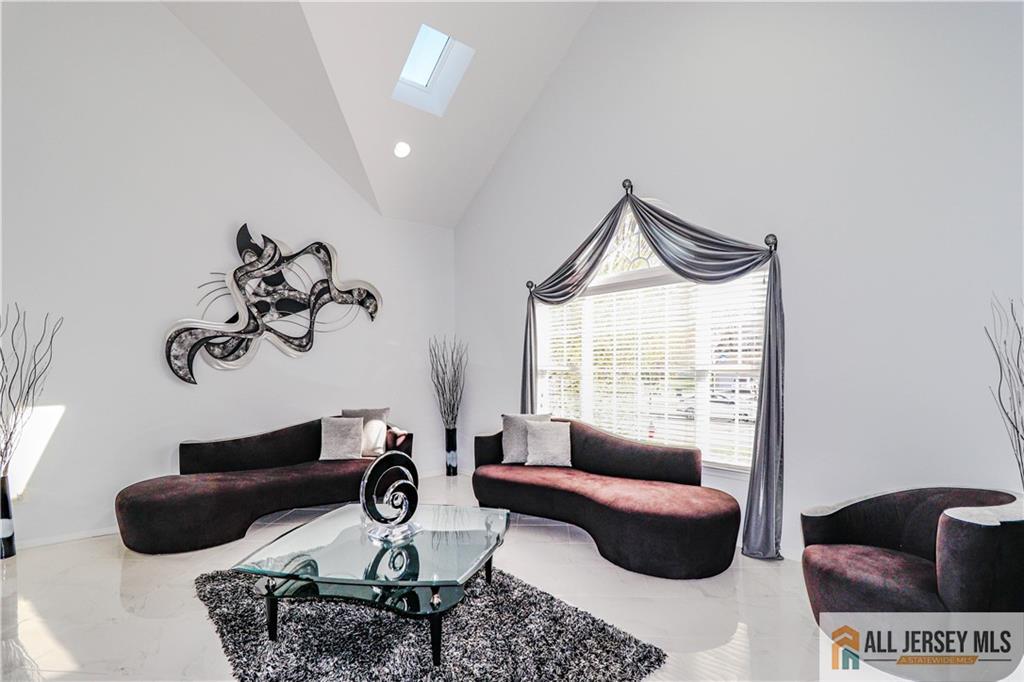 11 Markham Circle Old Bridge, NJ 08857 - Photo 4 of 61 a living room with furniture and a window