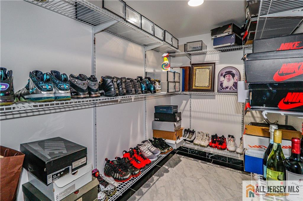 11 Markham Circle Old Bridge, NJ 08857 - Photo 42 of 61 a storage room with lots of clutter and storage