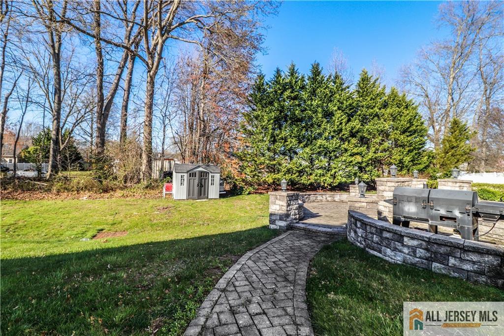 11 Markham Circle Old Bridge, NJ 08857 - Photo 46 of 61 a view of yard with tree in the background