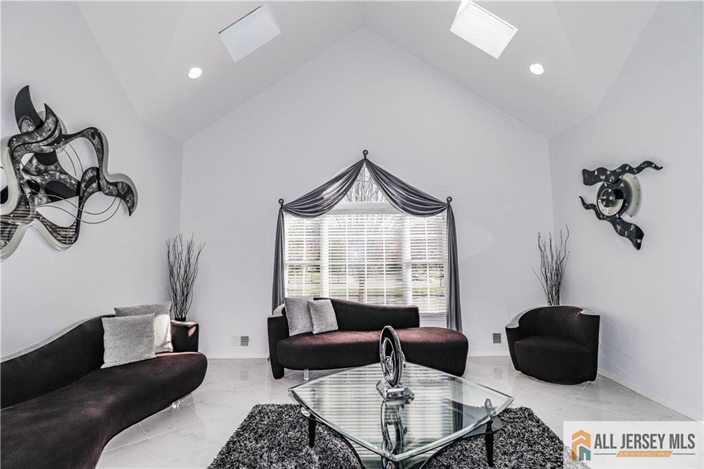 11 Markham Circle Old Bridge, NJ 08857 - Photo 5 of 61 a living room with furniture and a window