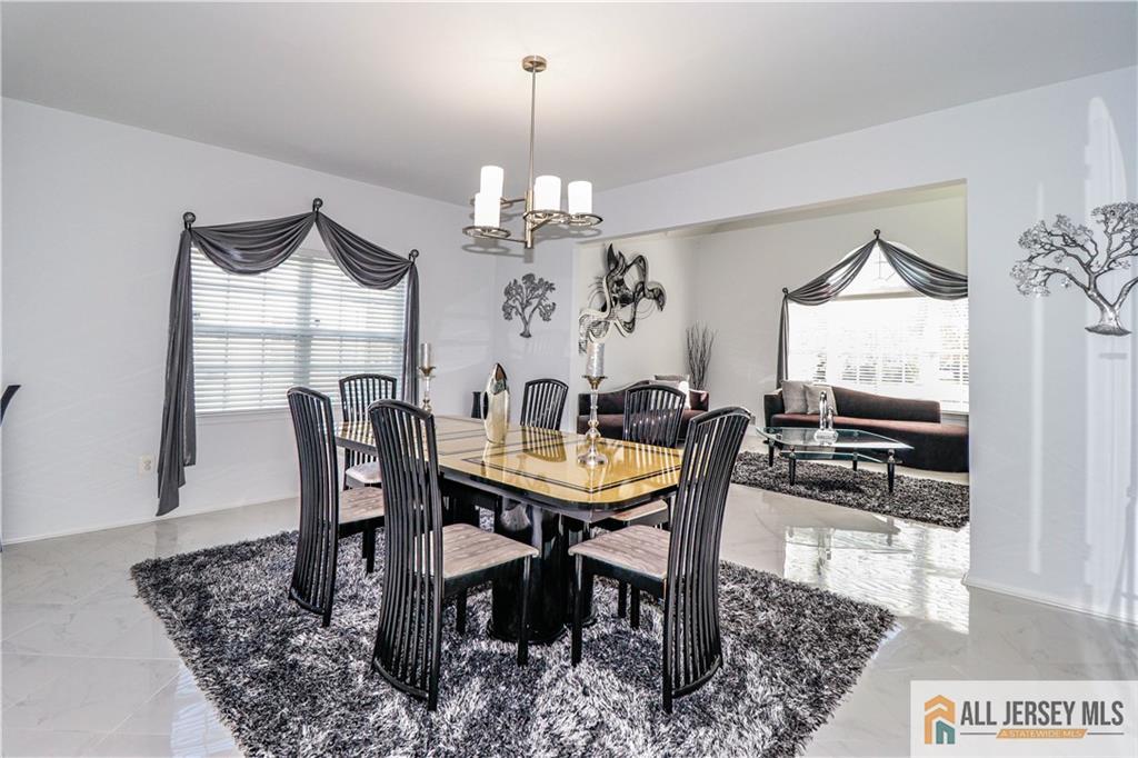 11 Markham Circle Old Bridge, NJ 08857 - Photo 6 of 61 a view of a dining room with furniture