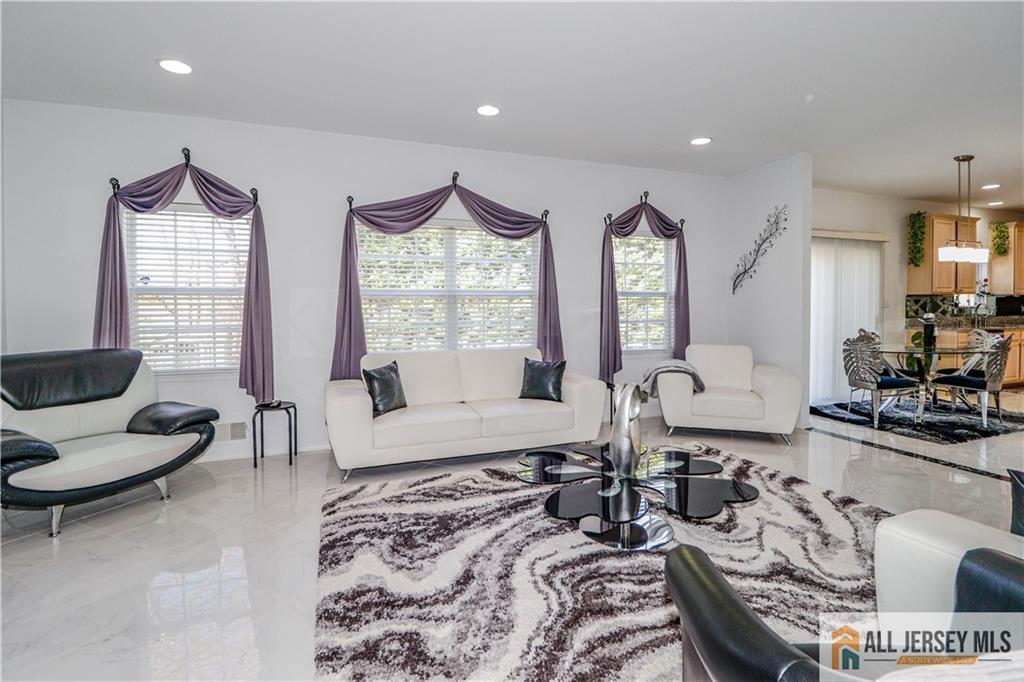 11 Markham Circle Old Bridge, NJ 08857 - Photo 8 of 61 a living room with furniture and a large window
