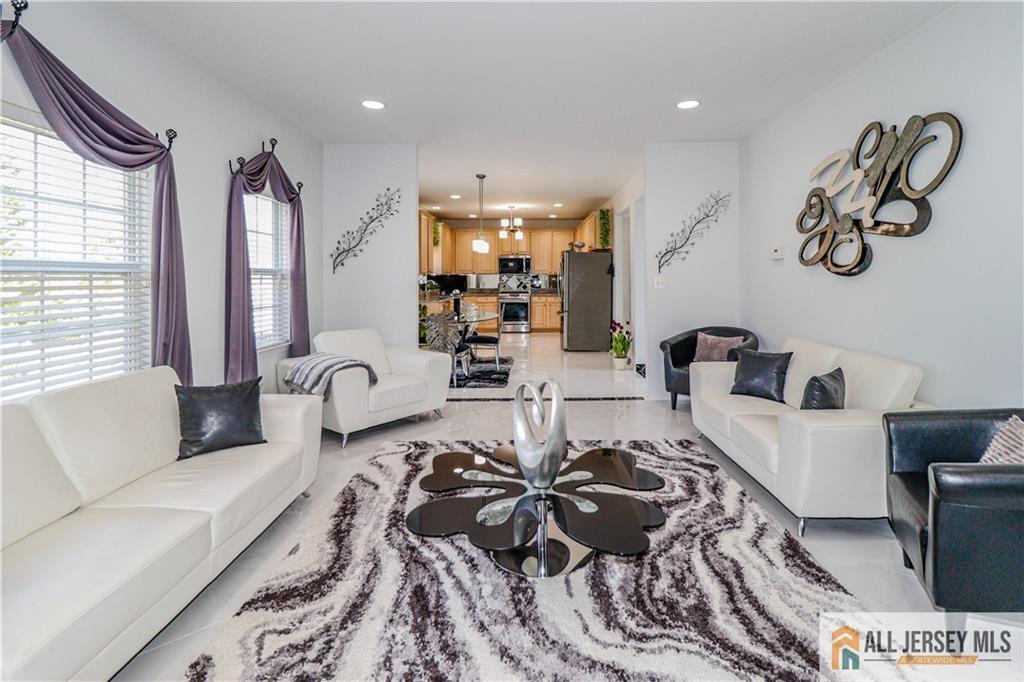 11 Markham Circle Old Bridge, NJ 08857 - Photo 9 of 61 a living room with furniture and a large window