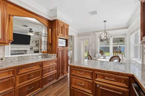 a kitchen with sink and window