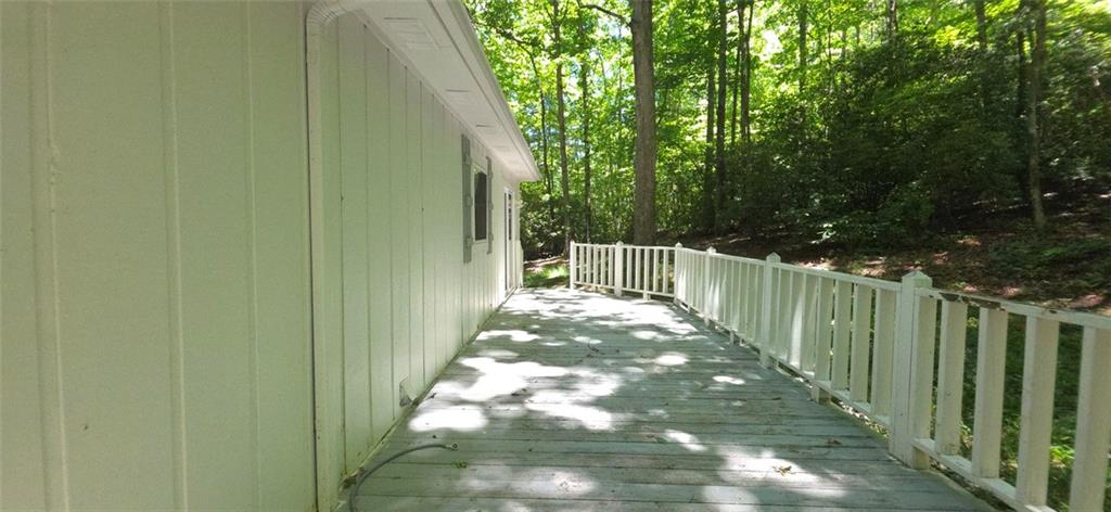1774 Joe Black Road Sautee Nacoochee, GA 30571 - Photo 20 of 20 a view of a pathway with a wooden fence