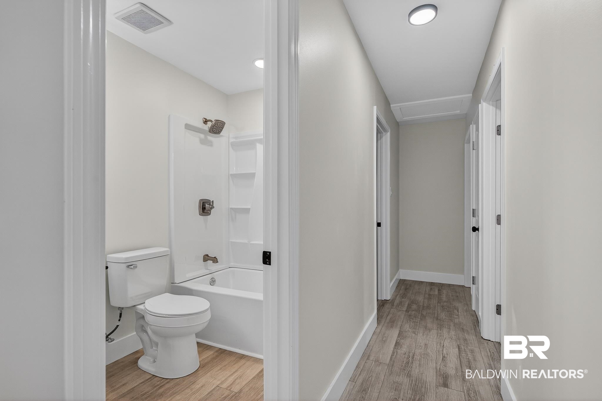 10650 Old Pascagoula Road Theodore, AL 36582 - Photo 35 of 77 Bathroom with shower / bathtub combination and light wood finished floors