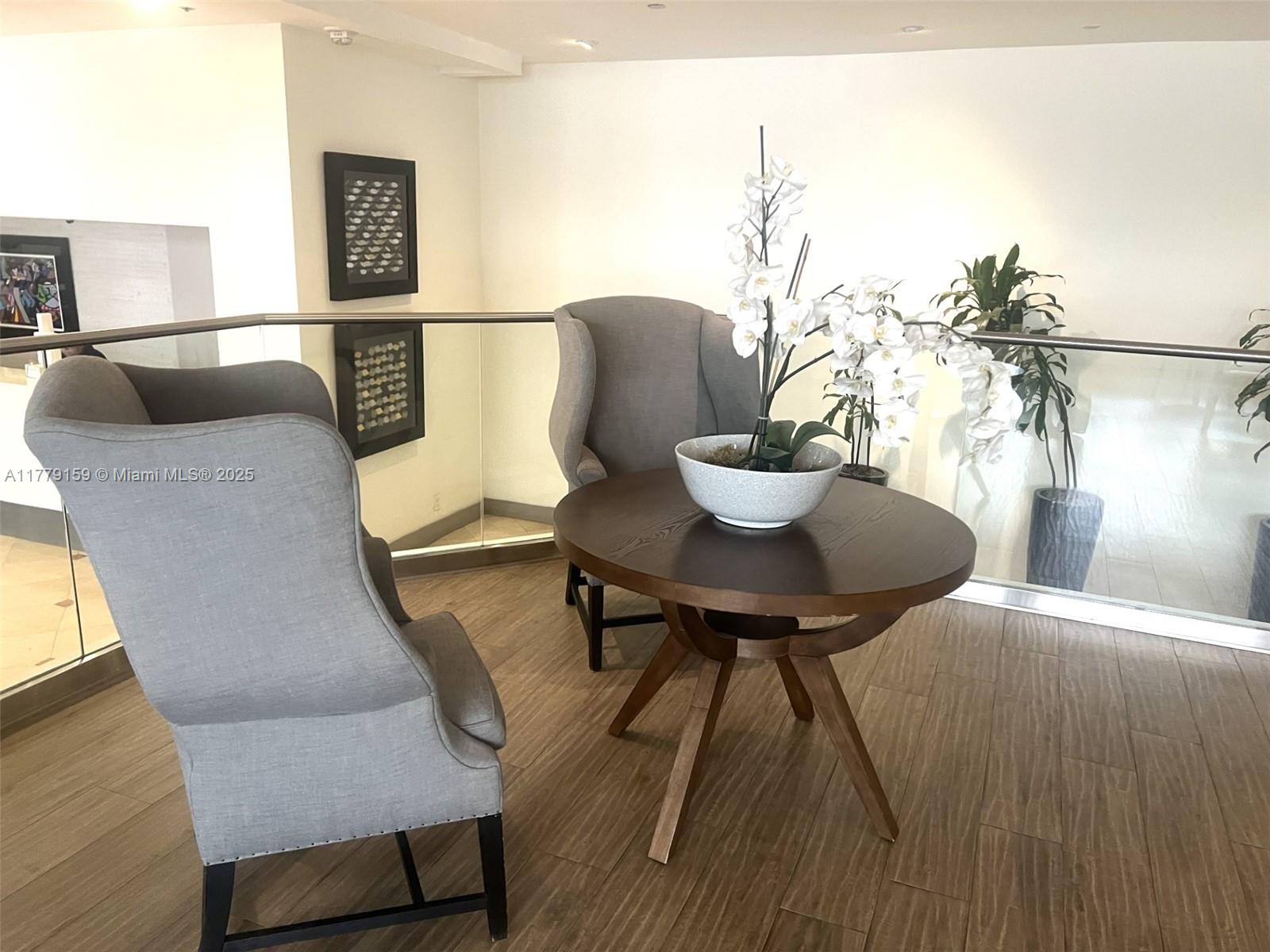 100 Lincoln Road, Unit 430 Miami Beach, FL 33139 - Photo 17 of 21 a view of a dining room with furniture and wooden floor