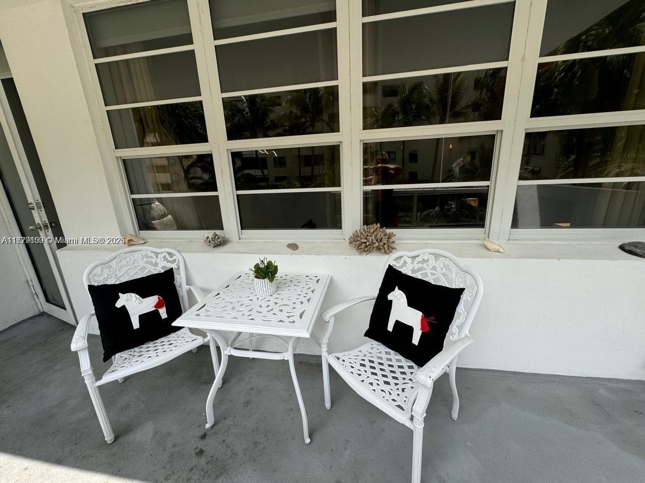 100 Lincoln Road, Unit 430 Miami Beach, FL 33139 - Photo 10 of 21 a view of a livingroom with furniture and entryway