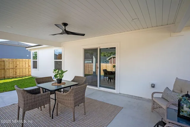 a view of a porch with a yard