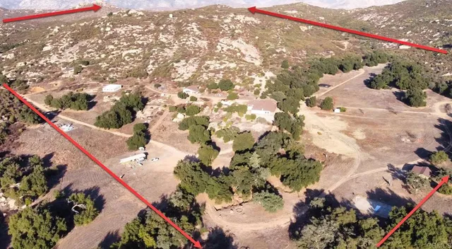 a view of house with a yard