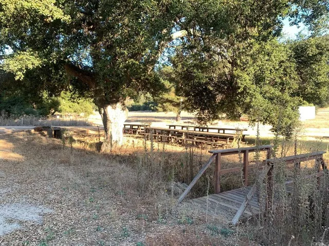 a outdoor space with lots of furniture and shower