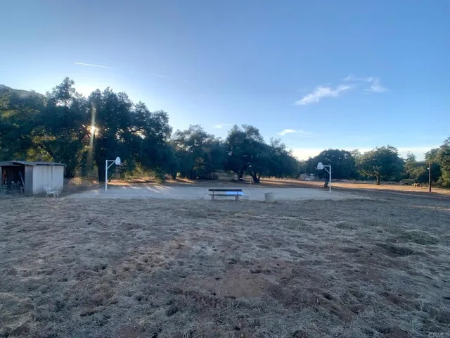 a bedroom with furniture and window
